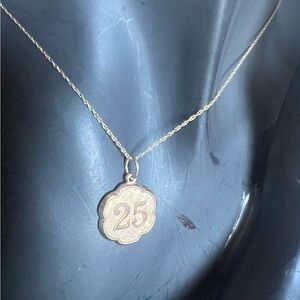 Hallmarked 10k sign by Rembrandt Elegant Gold Pendant Necklace with Number 25
